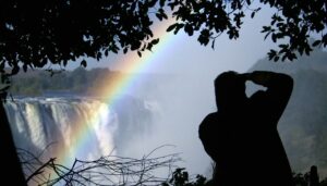Photographing the Victoria Falls with its beautiful rainbows