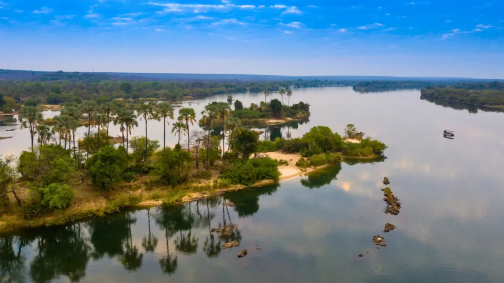Sunset cruise with lush green islands