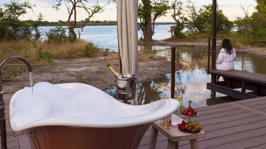 Lady enjoying the view of the zambezi river on her honeymoon