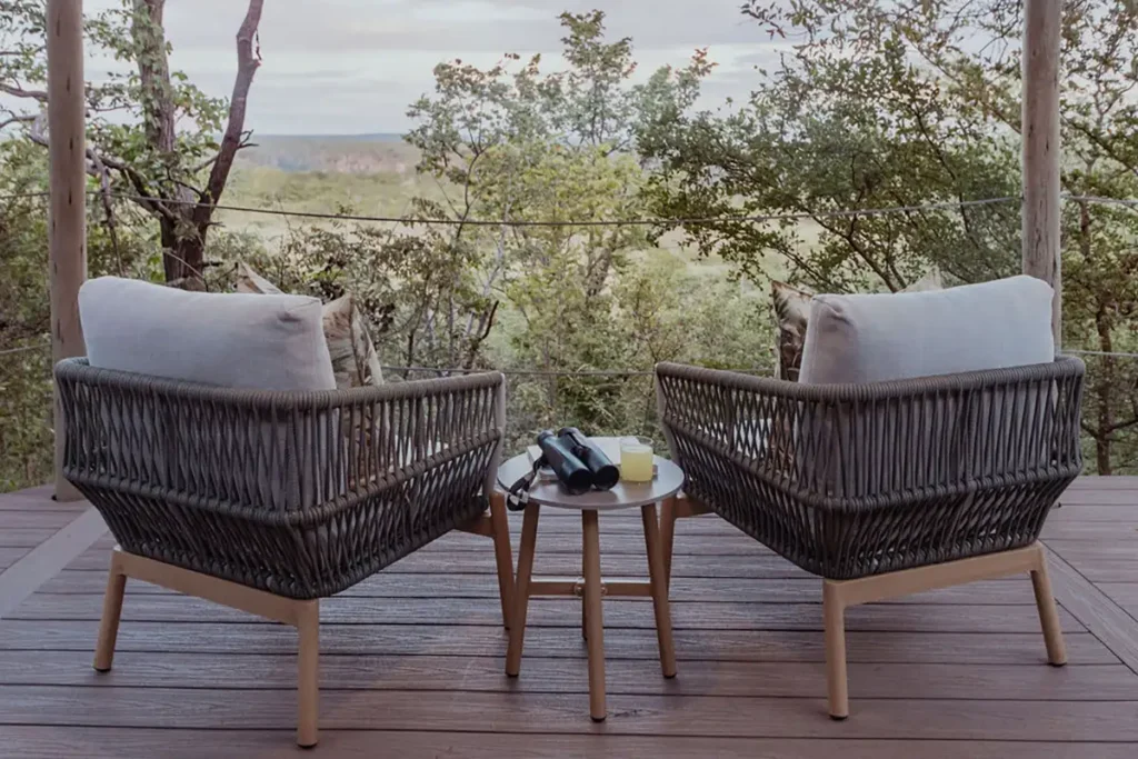Private pool deck at The Elephant Camp at dusk