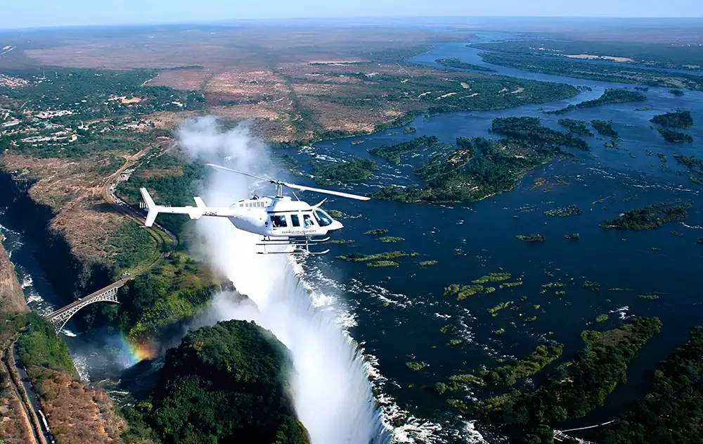 Use whichever activity image best suits the default selection for this itinerary. The Chobe Day Trip elephant herd shot or the helicopter aerial are the strongest visually.