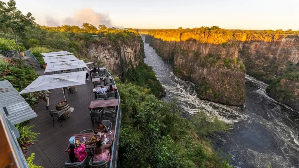 The Lookout Cafe deck on the edge of the Batoka Gorge overlooking the Zambezi and the Victoria Falls Bridge