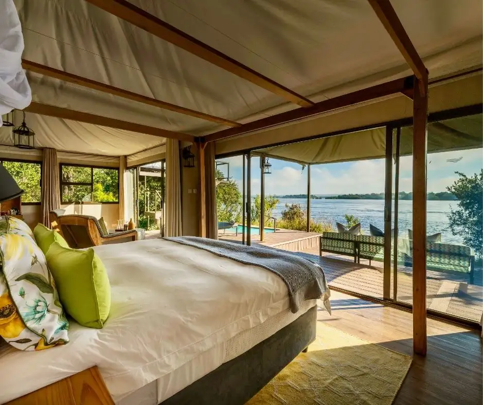 Luxury tented suite with private deck overlooking the Zambezi at Old Drift Lodge