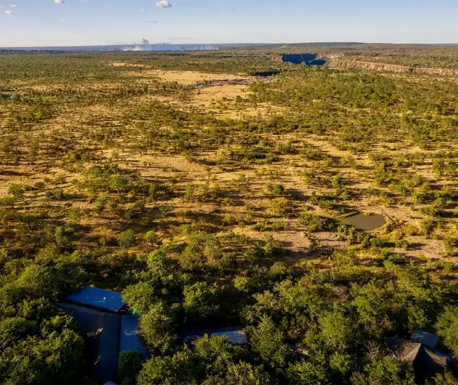 The Elephant Camp above the Batoka Gorge and The Wallow Lodge beside its waterhole near Victoria Falls